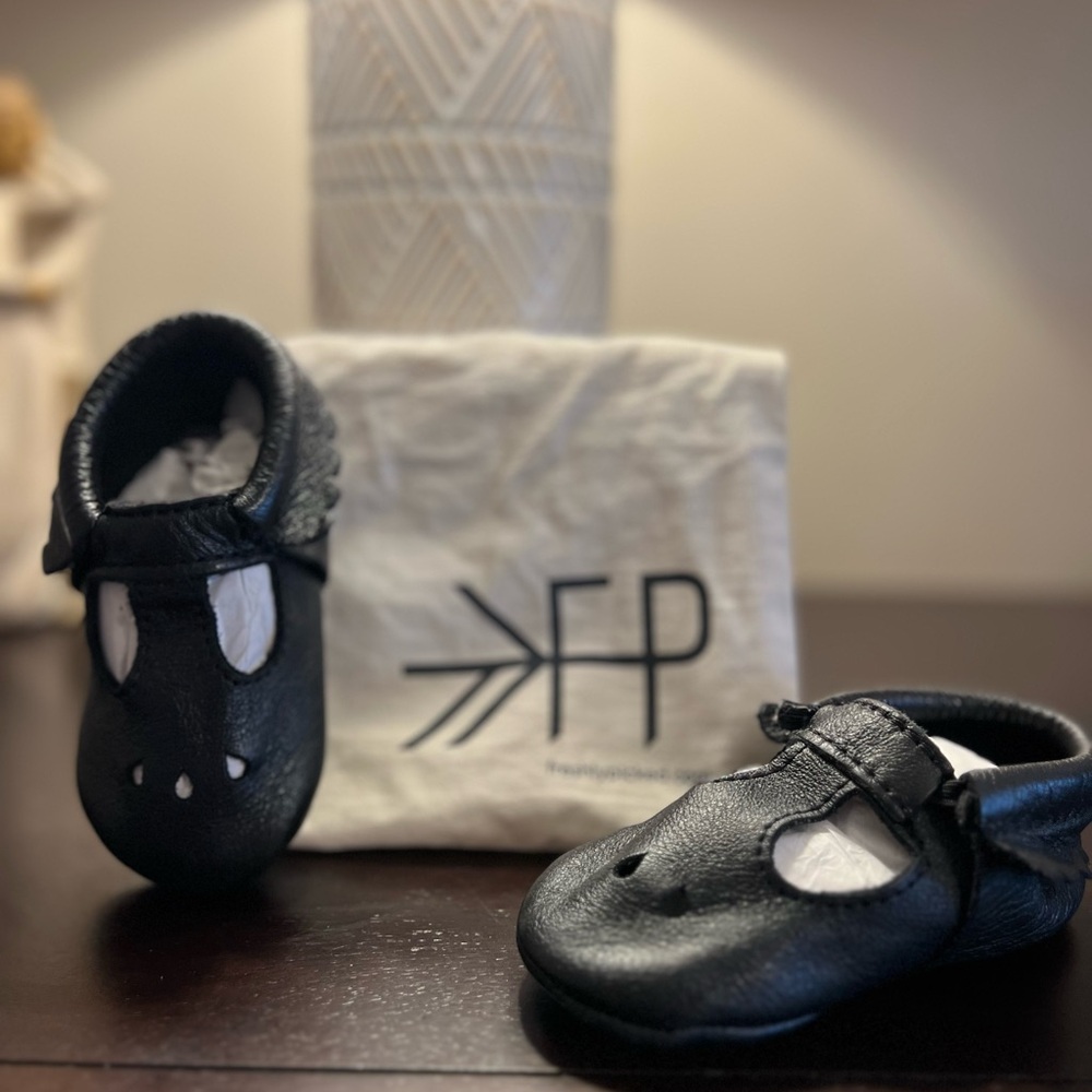 Freshly Picked Black Leather Baby T-Strap Moccasins